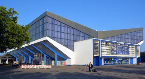 Exterior of the Grugahalle event hall in Essen with its butterfly-shaped roof