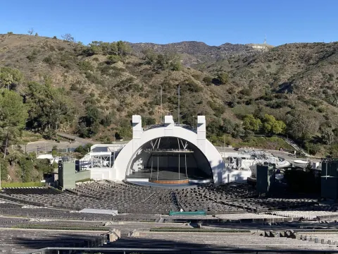 The Hollywood Bowl amphitheater and stage in Los Angeles in January 2024, with the Hollywood Sign on the hills behind