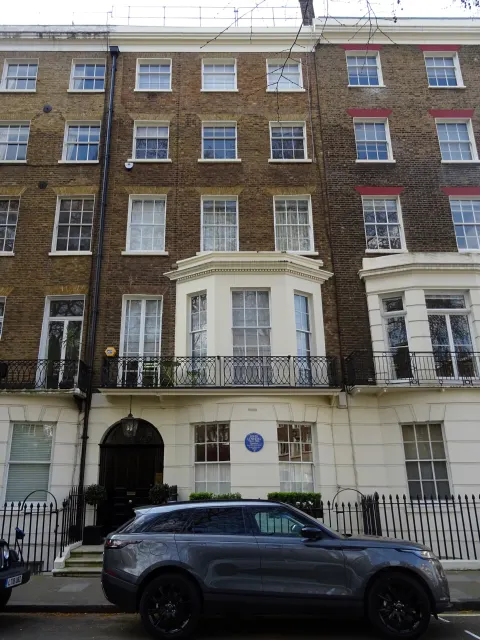 English Heritage blue plaque to John Lennon on 34 Montagu Square, Marylebone, London