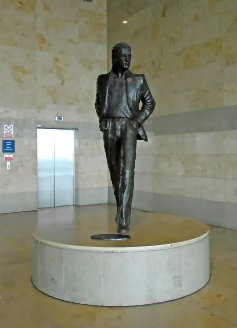 Tom Murphy's bronze John Lennon statue on the upper floor of the terminal at Liverpool John Lennon Airport