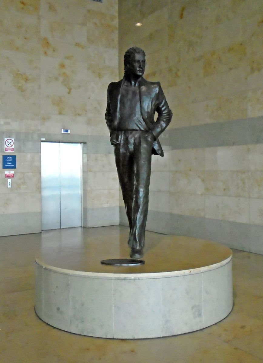 Tom Murphy's bronze John Lennon statue on the upper floor of the terminal at Liverpool John Lennon Airport