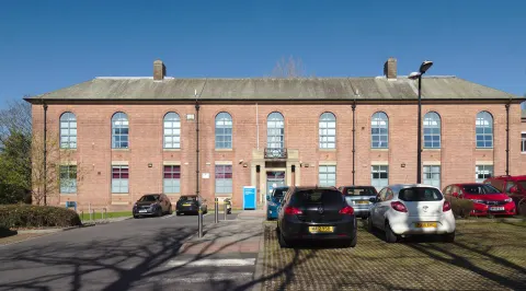 Red-brick front of Litherland Town Hall on Hatton Hill Road, Litherland, now a health centre, in 2021