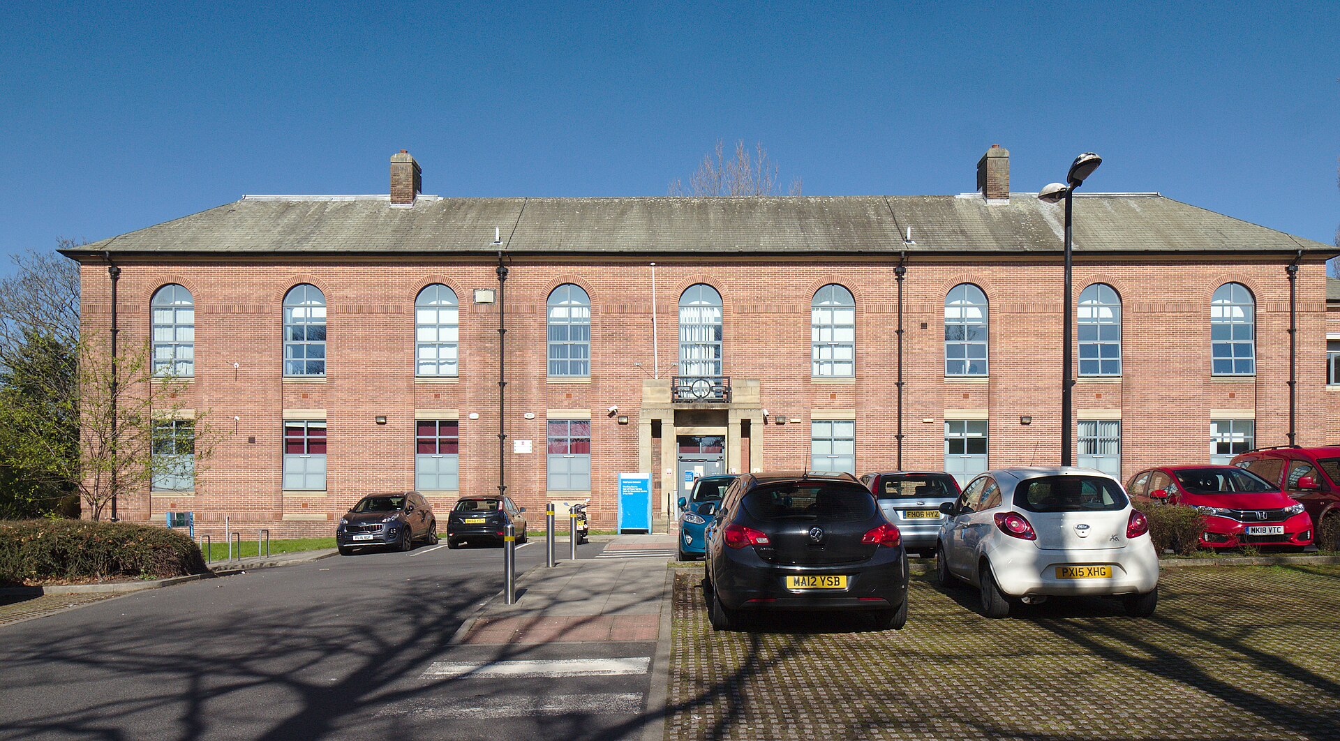 Red-brick front of Litherland Town Hall on Hatton Hill Road, Litherland, now a health centre, in 2021