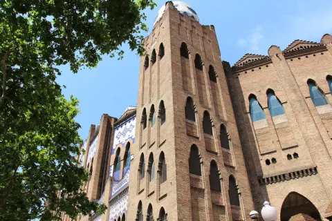 Brick and tiled facade of La Monumental bullring on Gran Via in Barcelona