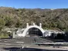 The Hollywood Bowl amphitheater and stage in Los Angeles in January 2024, with the Hollywood Sign on the hills behind