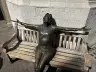 Lawrence Holofcener's bronze Imagine statue of John Lennon on a bench on Carnaby Street, London