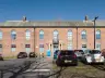 Red-brick front of Litherland Town Hall on Hatton Hill Road, Litherland, now a health centre, in 2021