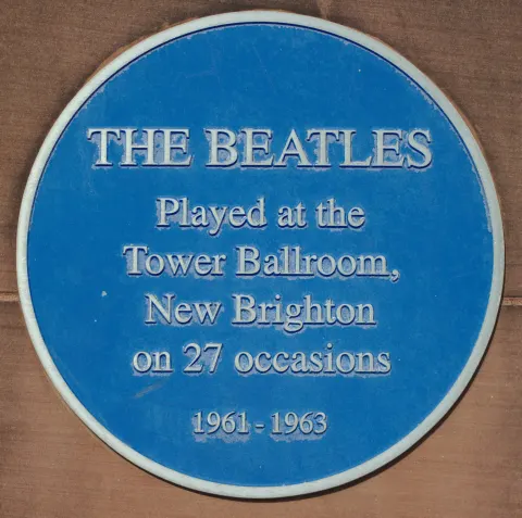 Blue Beatles plaque on Tower Promenade, New Brighton, beside the site of the Tower Ballroom, in 2020