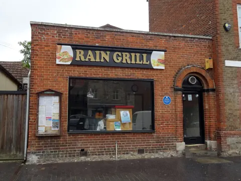 Blue plaque for the Beatles' Magical Mystery Tour on the Rain Grill, 90 High Street, West Malling, Kent