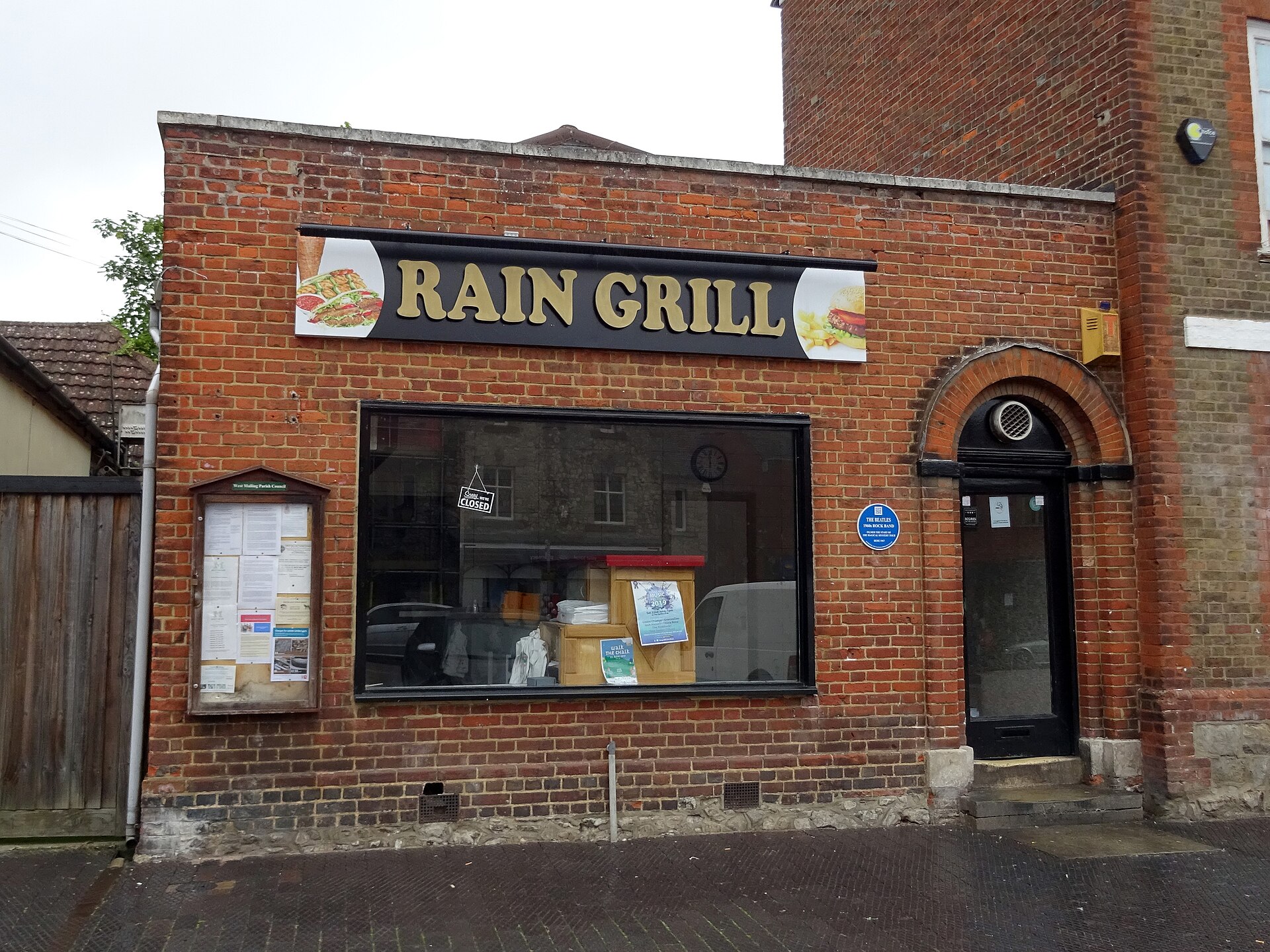 Blue plaque for the Beatles' Magical Mystery Tour on the Rain Grill, 90 High Street, West Malling, Kent